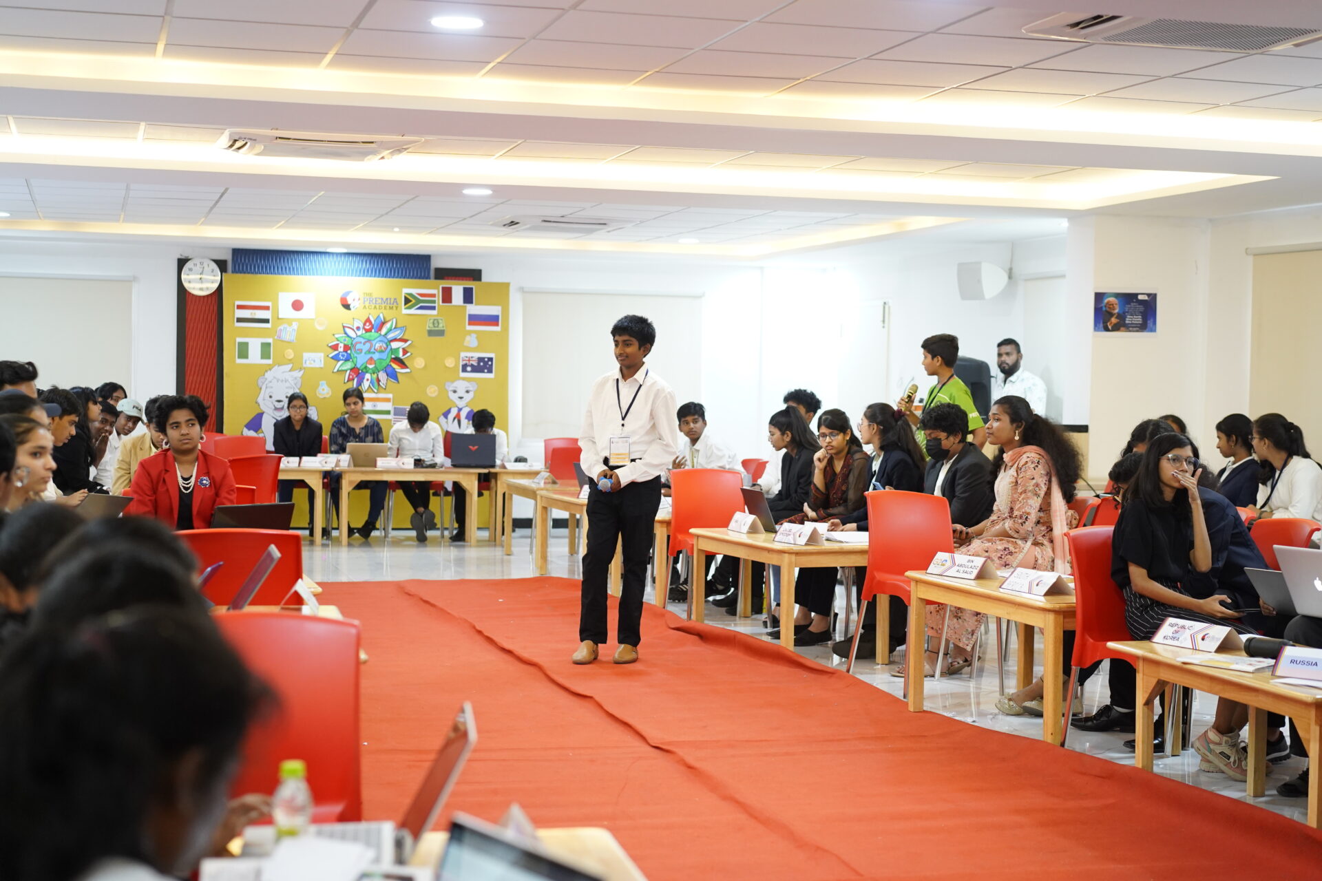 Premia Academy students participating in a large-scale Model UN (MUN) conference debating global issues