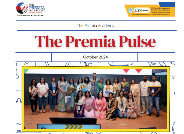 teachers and staff posing on stage after a recognition ceremony