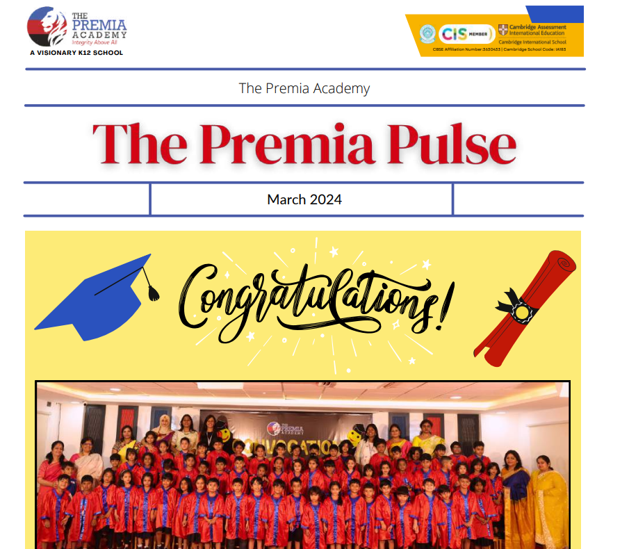 primary students and teachers posing at the school graduation ceremony