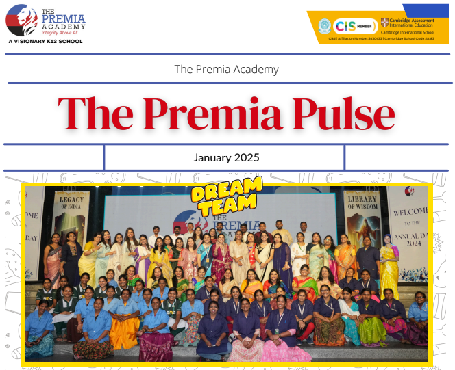 faculty and support staff posing together on stage for the Annual Day event