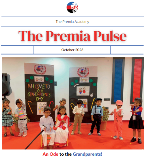 primary students dressed up and performing on stage for Grandparents' Day