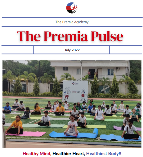Premia Academy students practicing yoga for International Yoga Day