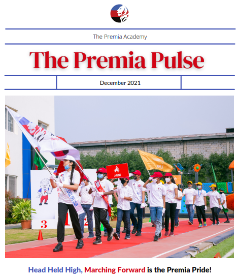 students marching with flags and school house banners